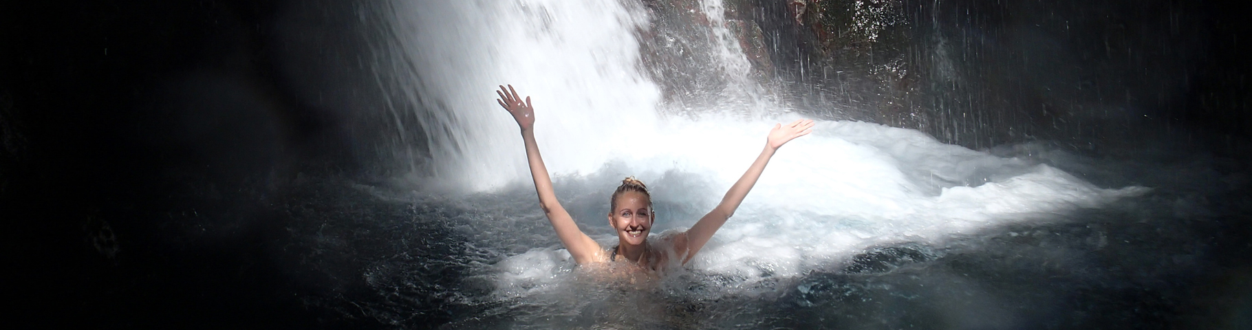 Swimming in a huge waterfall